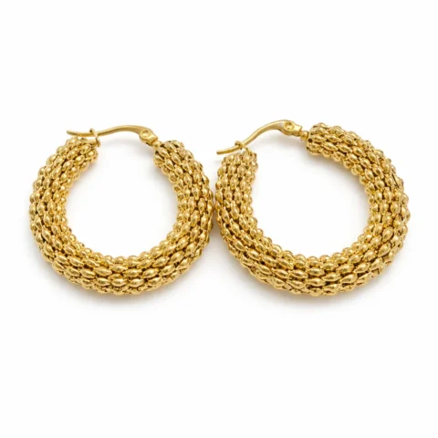 aros dorados tipo eslabón Nexus sobre fondo blanco