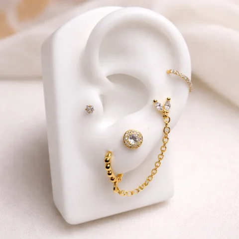 piercing Nexa Halo en oreja cartílago rosca trasera dorado