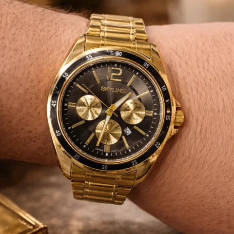 reloj skyline prestige gold con esfera negra y pulsera de acero inoxidable