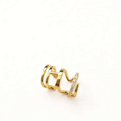 Ear cuff dorado doble sin perforación sobre fondo blanco, diseño Lía Doble en acero inoxidable