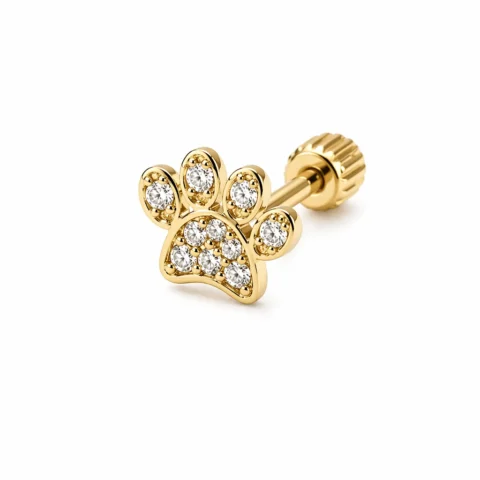 Piercing Nexa Paw dorado con diseño de huella en acero quirúrgic