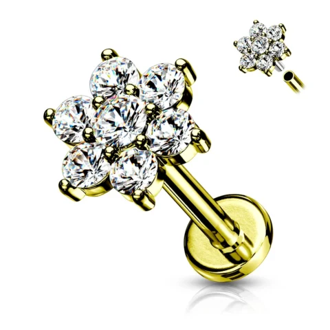 Piercing Auralis Flor dorado con circonitas sobre fondo blanco