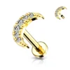 Piercing Auralis Luna dorado con circonitas sobre fondo blanco